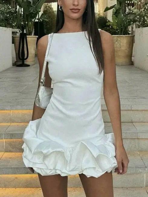 Women's floral mini dress with delicate ruffles, flattering fit, playful chic style for brunch outings