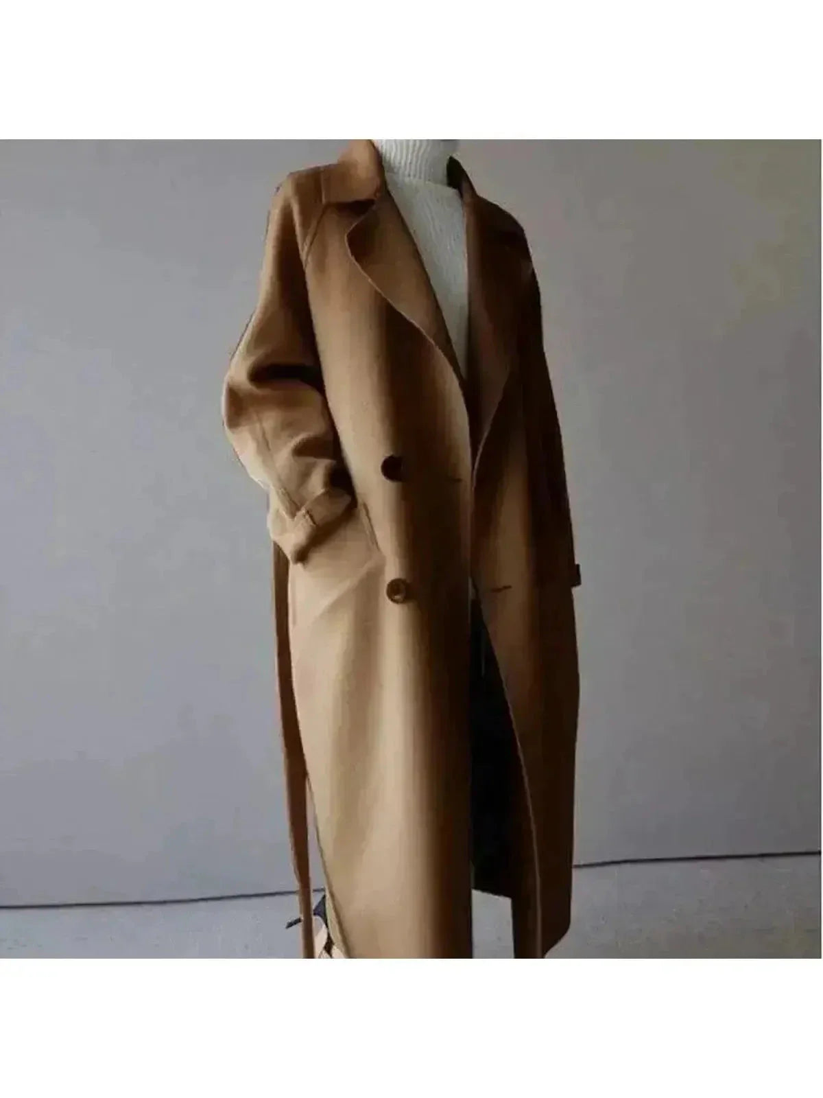 Women's elegant long coat in premium fabric, structured silhouette with sophisticated office-ready style