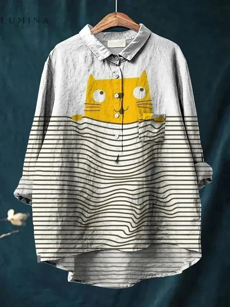 Unisex white long-sleeve cotton tee featuring vibrant cat art graphic print, relaxed over-hip fit