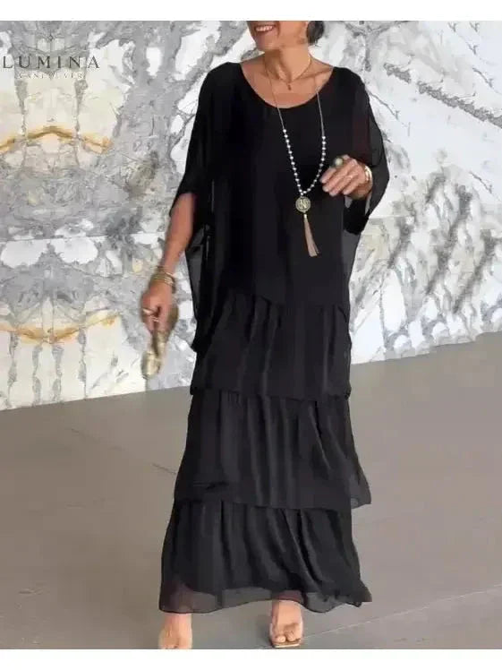 Caroline loose round neck maxi dress elegant fluid silhouette feminine chic comfort style