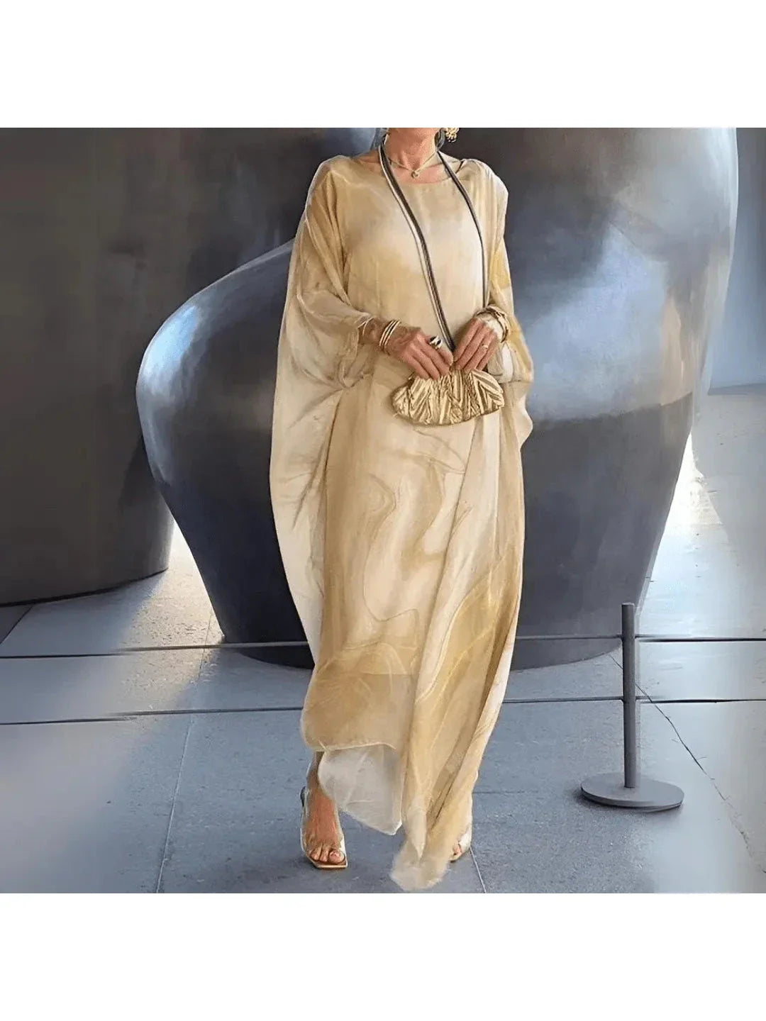 Women's flowing printed maxi dress relaxed ankle-length silhouette lightweight fluid drape warm-weather