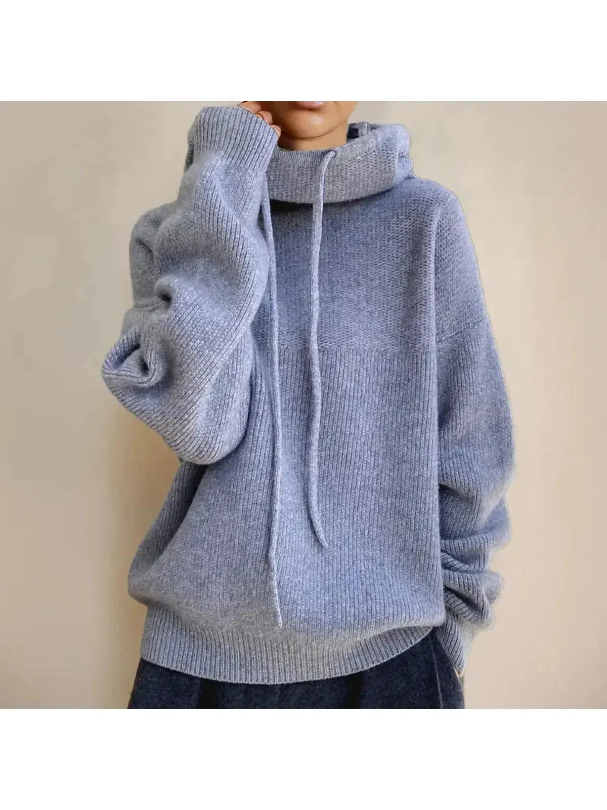 Women's cozy knit sweater neutral tone relaxed fit plush soft fabric timeless silhouette all-day comfort