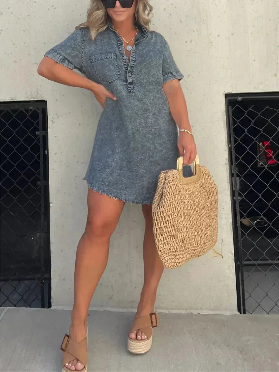 Light blue denim mini shirt dress relaxed fit with button-front placket and subtle stretch fabric