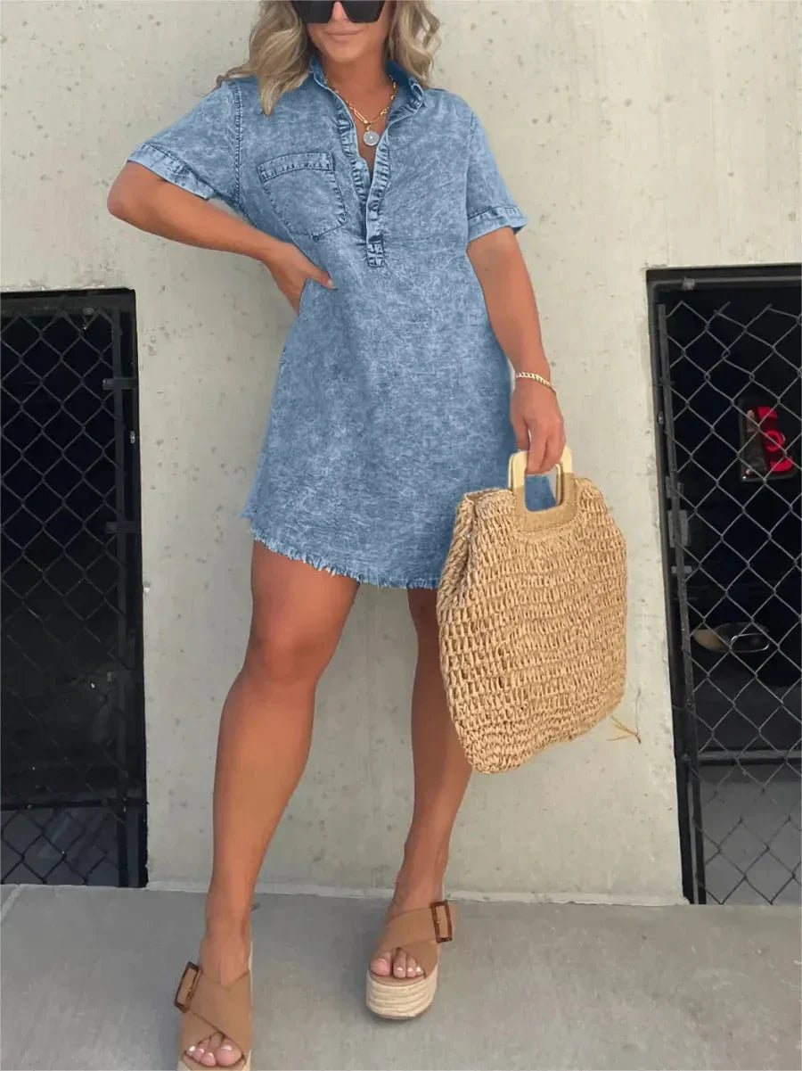 Light blue denim mini shirt dress relaxed fit with button-front closure and subtle stretch