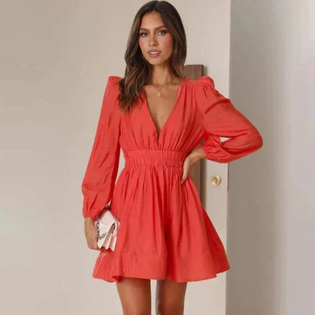 Black fit-and-flare mini dress deep V-neck sculpted puff shoulders stretch rayon day-to-night