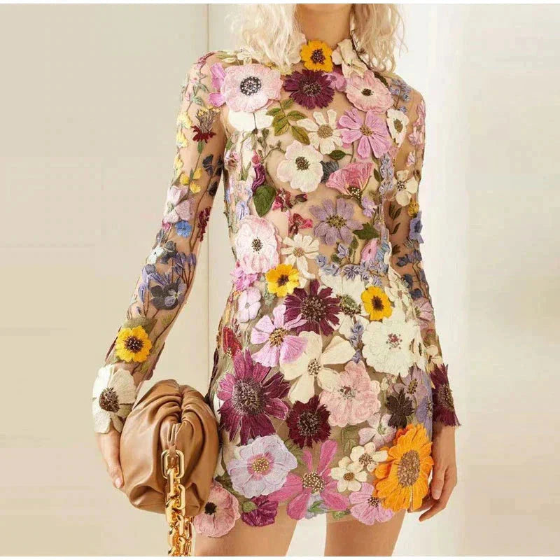 Multicolor floral embroidered sheer mesh mini dress with long sleeves, nightlife-ready couture silhouette