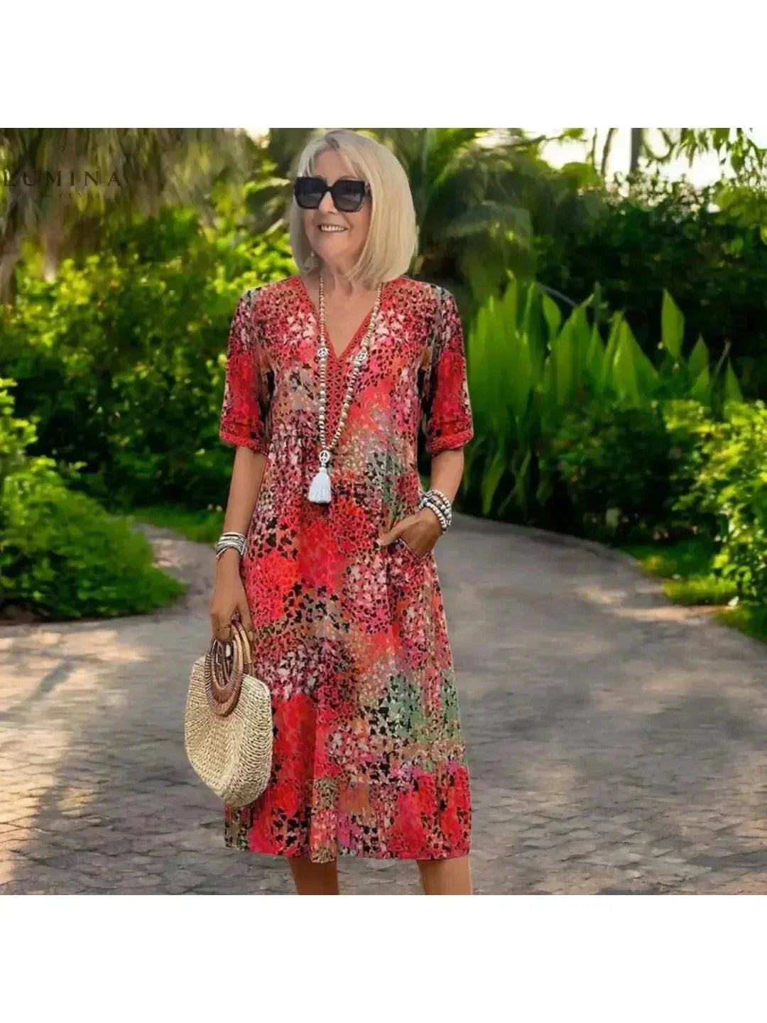Women's Isla lightweight spring dress in vibrant colors, flowing silhouette with relaxed versatile cut