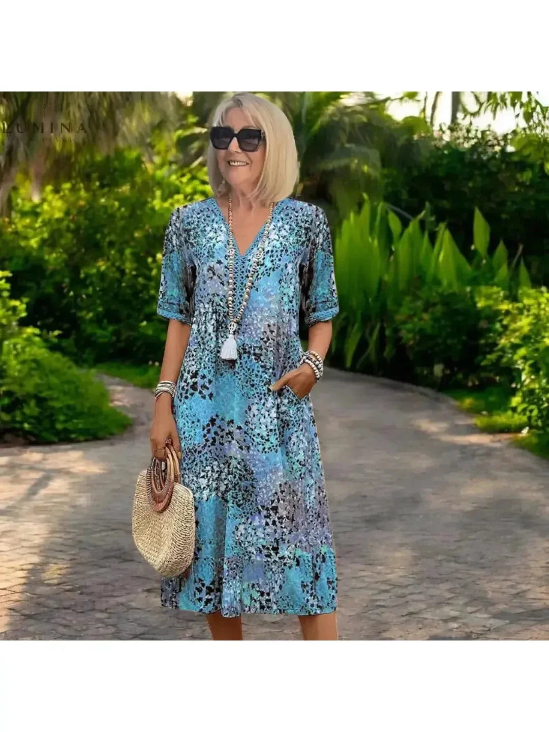 Women's Isla lightweight spring dress in vibrant colors, relaxed flowing silhouette for brunch outings