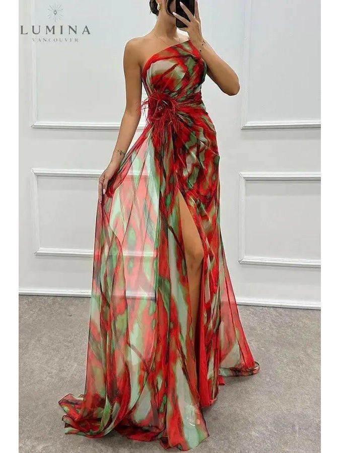 Vibrant printed maxi dress one-shoulder neckline side slit modern eveningwear silhouette