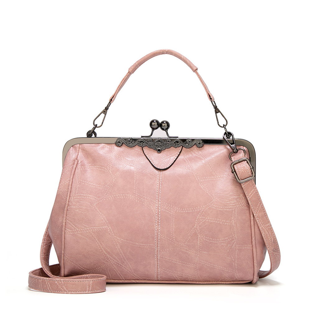 Jacqueline structured faux leather handbag in neutral tone with vintage clasp closure and adjustable strap