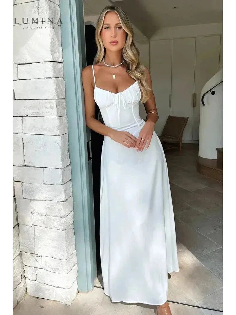 Ivory sleeveless maxi dress with lace-up front detail, boho chic silhouette for women