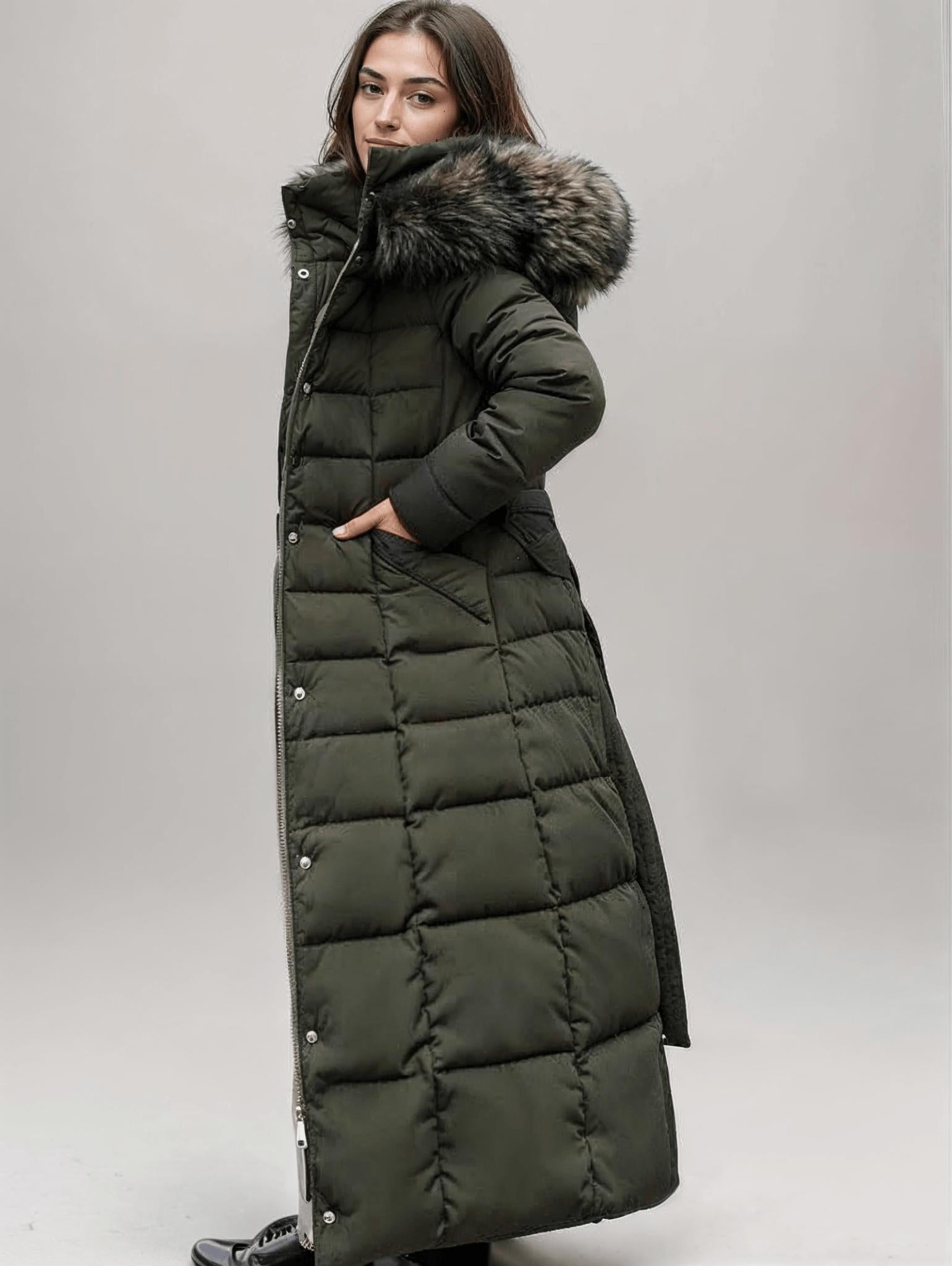 Women's long puffer jacket with belted waist, hood, and snap buttons for winter wind protection