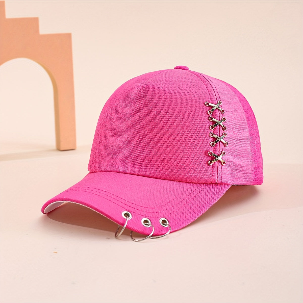 Unisex structured black cap with stainless steel lace-up hardware and triple front ring street style