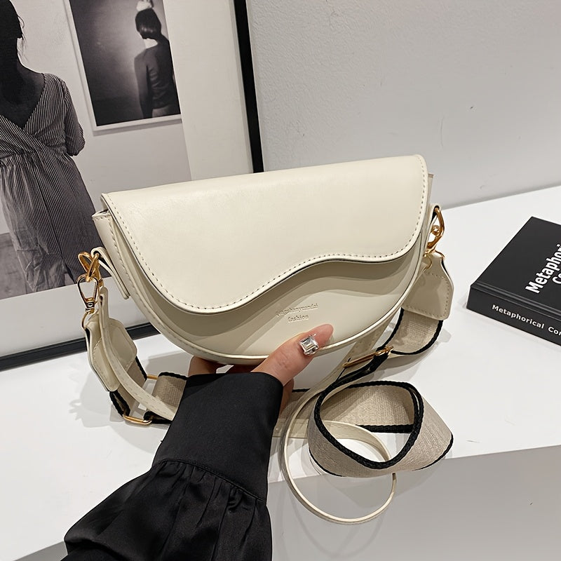 Avelina mini saddle crossbody bag smooth matte vegan leather wave-edge flap magnetic closure minimalist