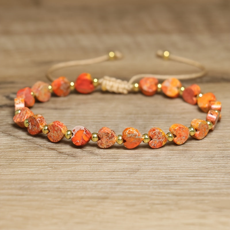 Adjustable stone bracelet with heart-shaped gemstone beads, natural marbling, and gold-tone accents