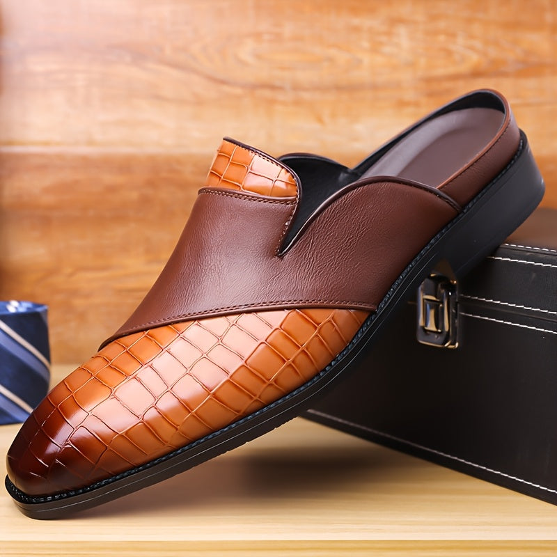 Men's brown crocodile-embossed leather mule loafer with open-back slip-on design and cushioned footbed
