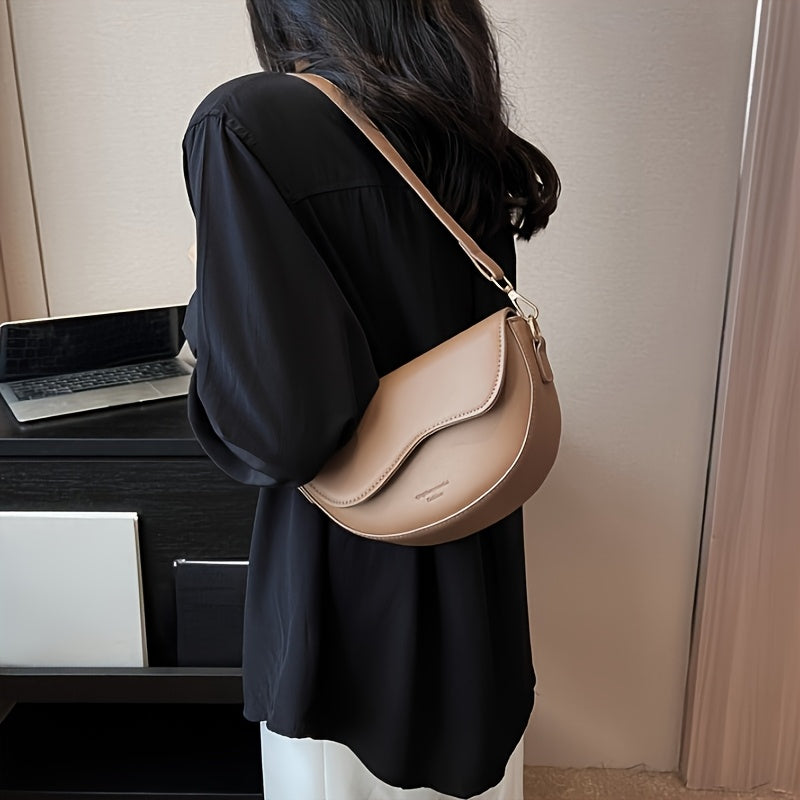 Avelina mini saddle crossbody bag smooth matte vegan leather wave-edge flap magnetic closure minimalist