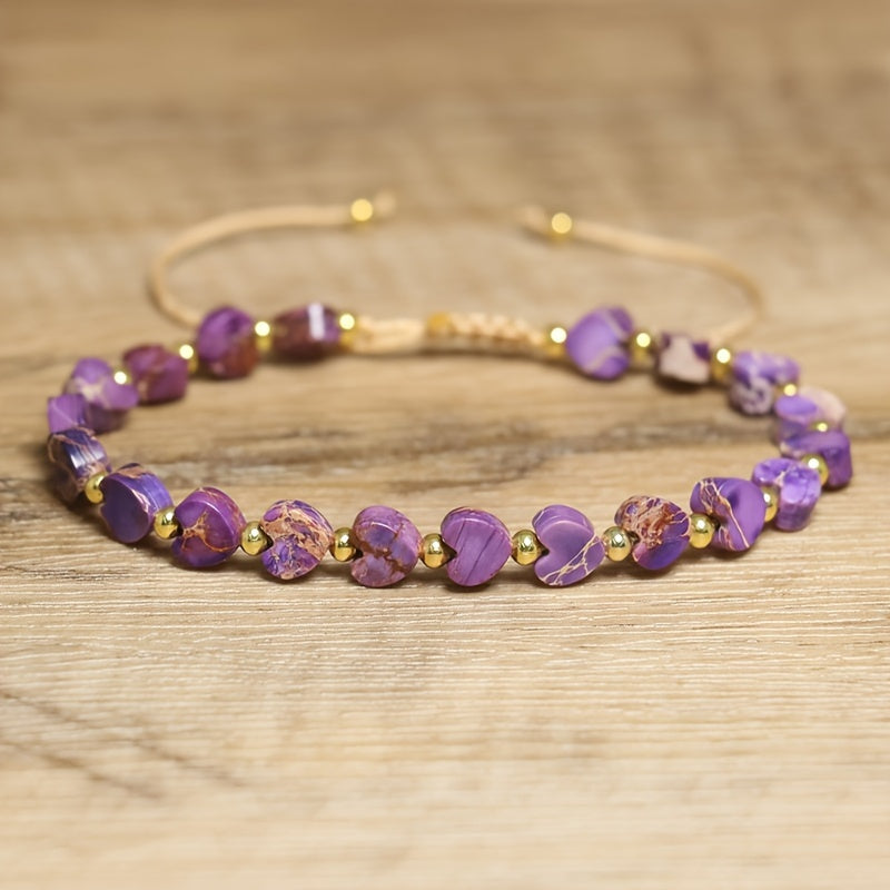 Adjustable stone bracelet with heart-shaped gemstones, natural marbling, and polished gold-tone accents