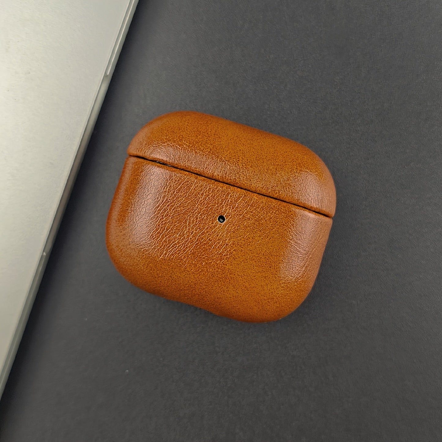 Executive slim full-grain leather AirPods case drop-resistant wireless charging ready professional patina