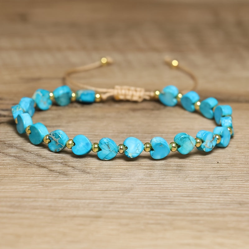 Adjustable stone bracelet with heart-shaped gemstones, natural marbling, and polished gold-tone accents