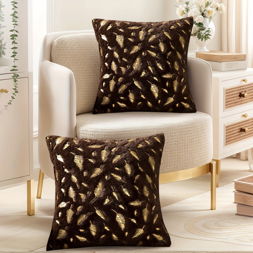 Ultra-soft faux fur throw pillow cover with shimmering metallic gold foil feather accents for luxe decor