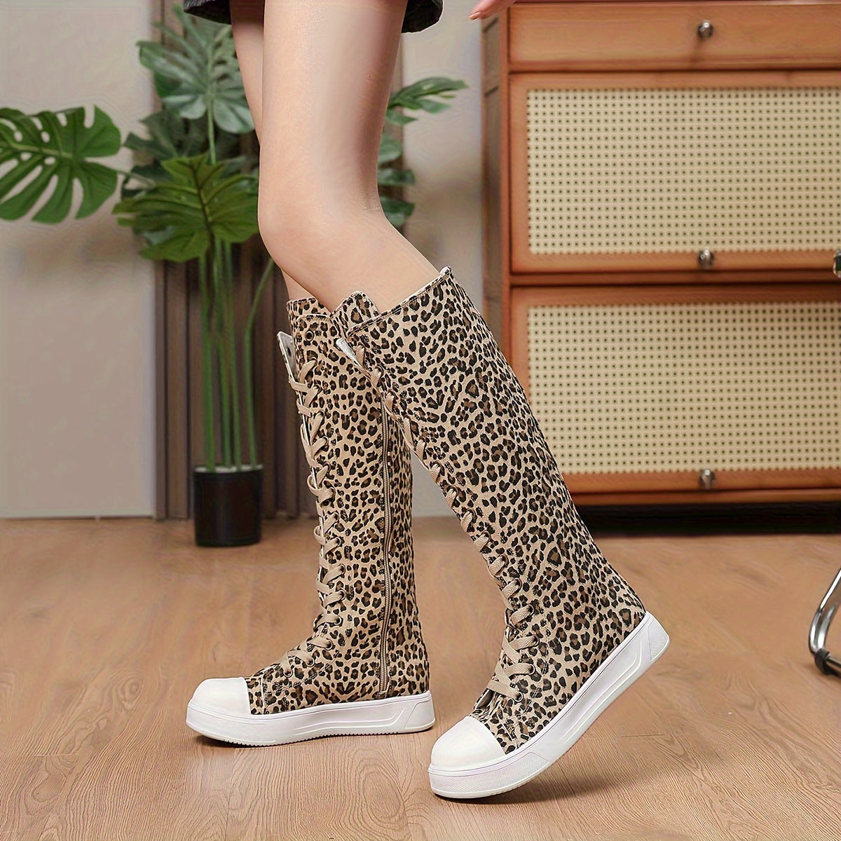 Black knee-high platform canvas lace-up boot with chunky sole for bold street style