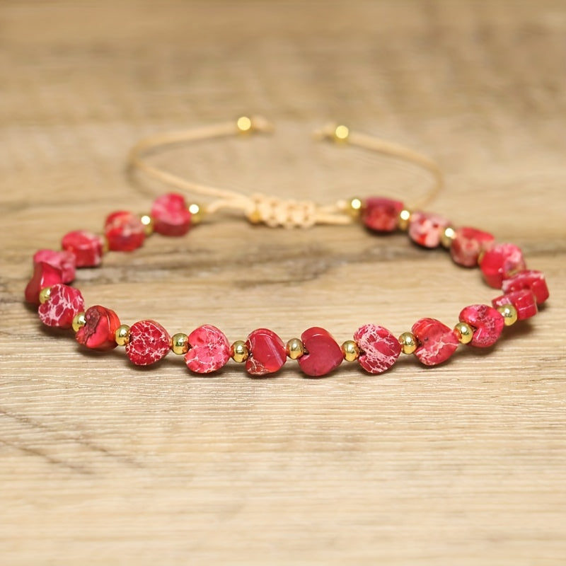 Adjustable stone bracelet with heart-shaped gemstones, natural marbling, and polished gold-tone accents