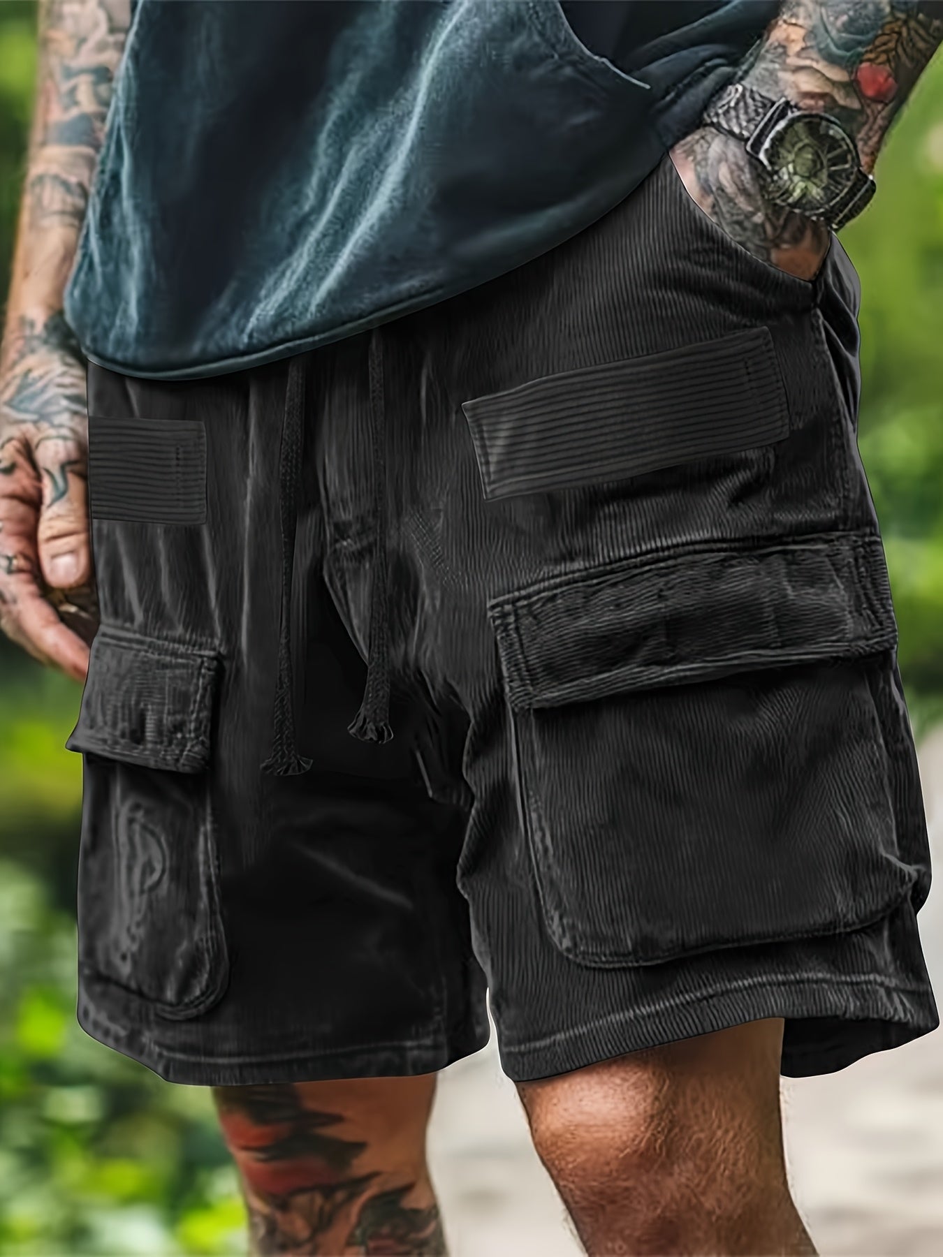 Men's wide-wale corduroy cargo shorts in relaxed fit with oversized side pockets and soft texture