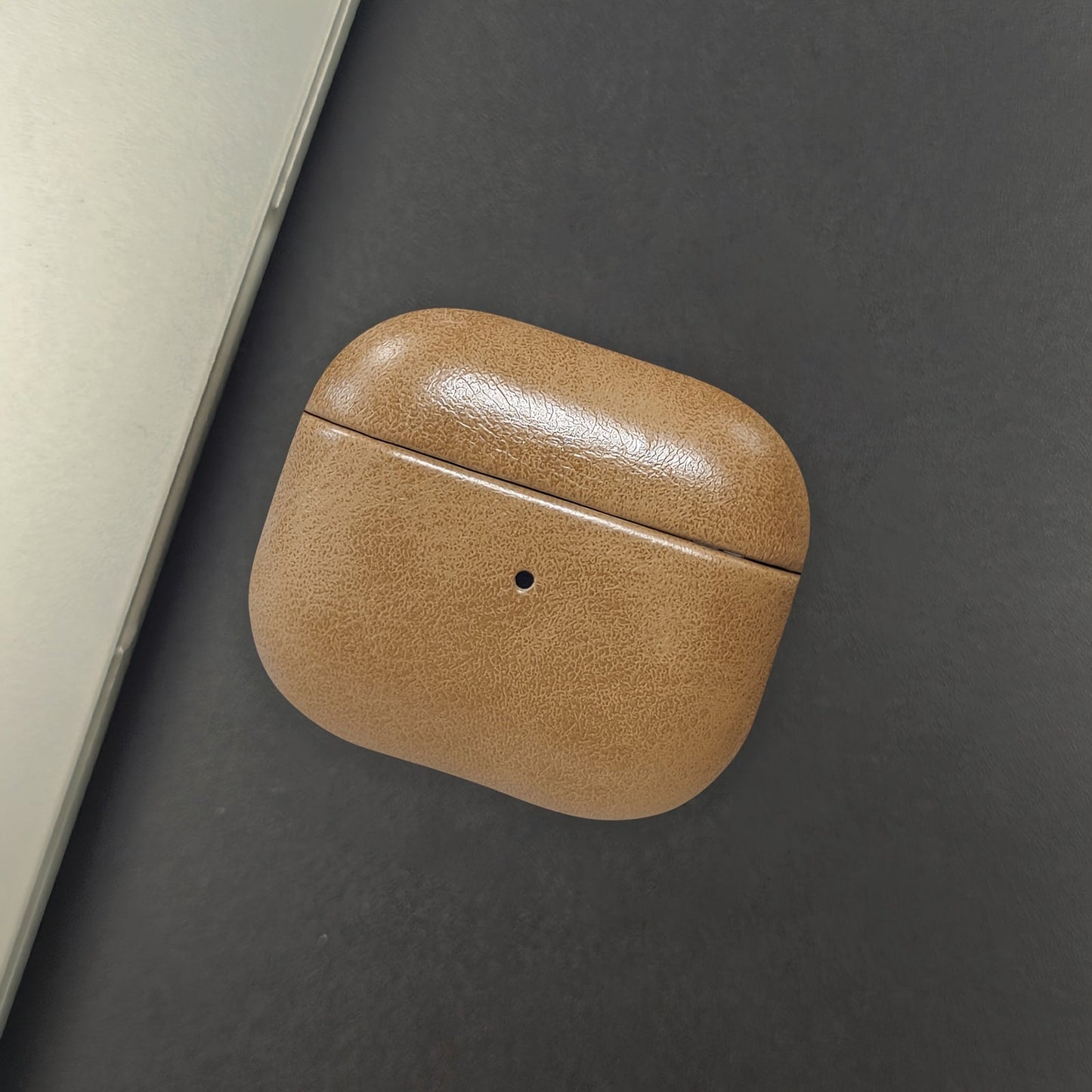 Premium full-grain leather AirPods case slim drop-resistant wireless charging ready professional design