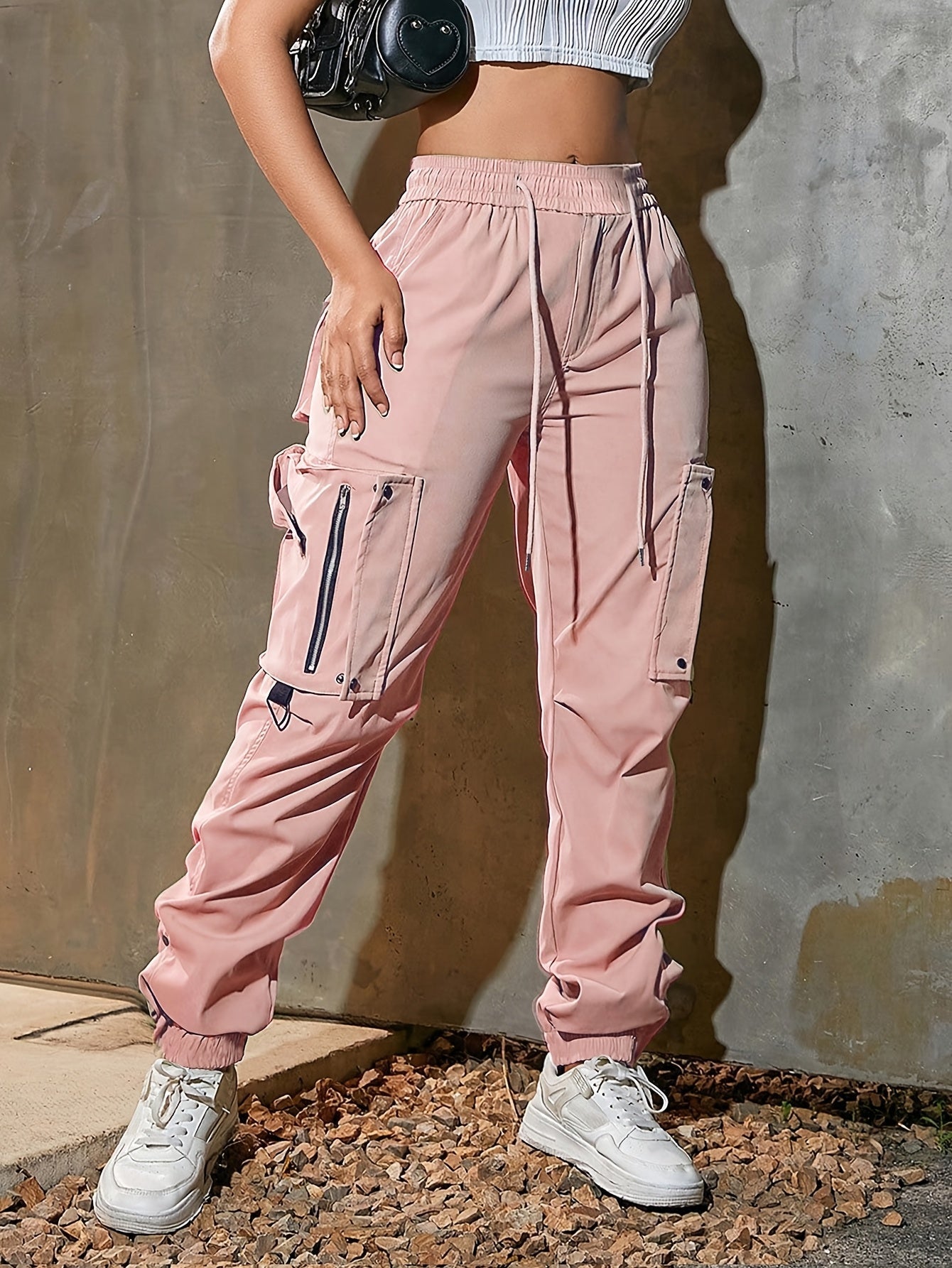 Men's black cargo jogger pants lightweight tech fabric oversized pockets D-ring hardware streetwear