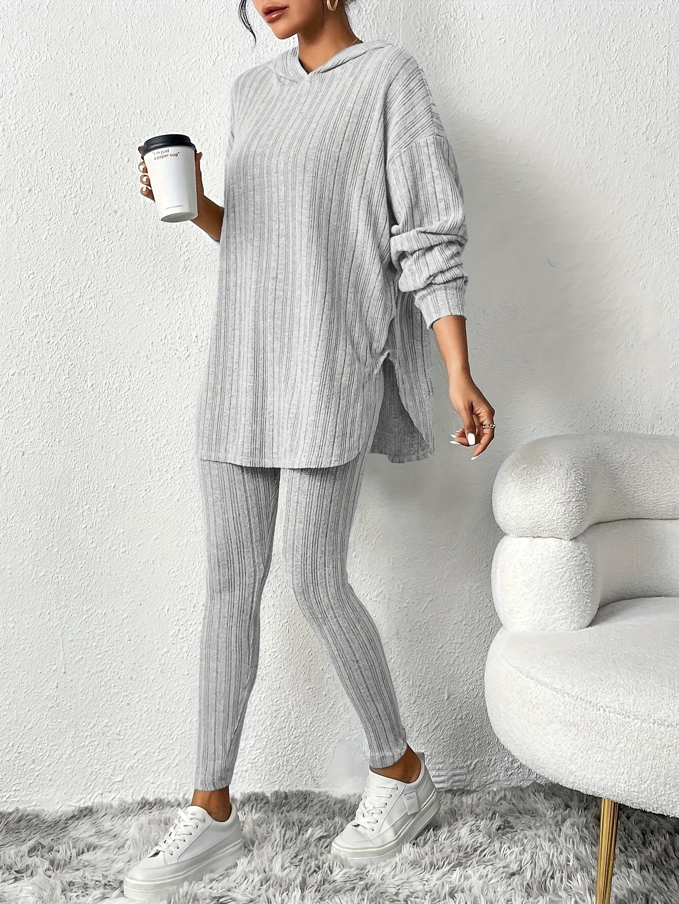 Women's ribbed knit lounge set in neutral tone, oversized hoodie with sculpting high-waist leggings
