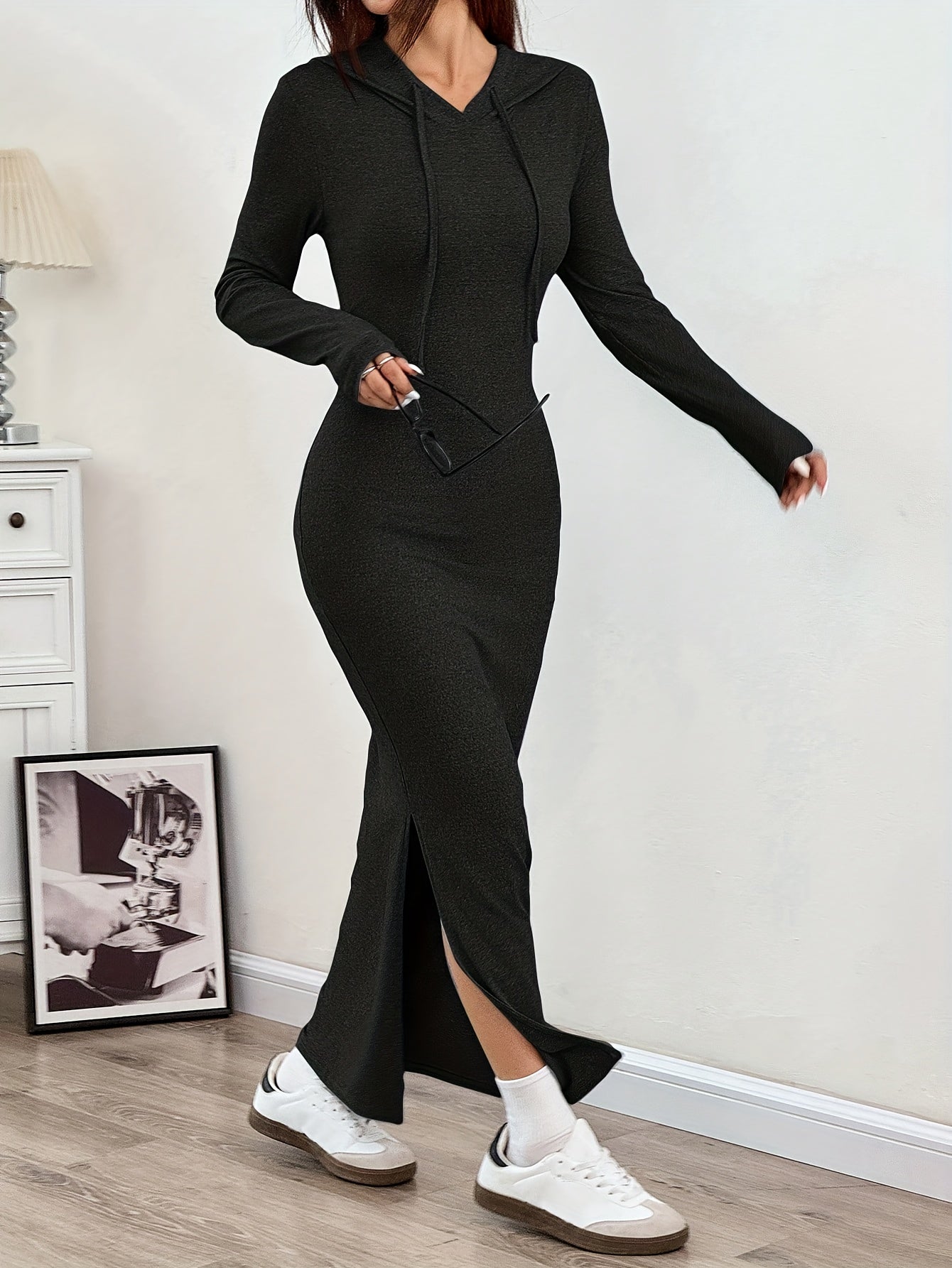 Black hooded bodycon maxi dress poly-stretch contoured fit with side slit modern minimalist style