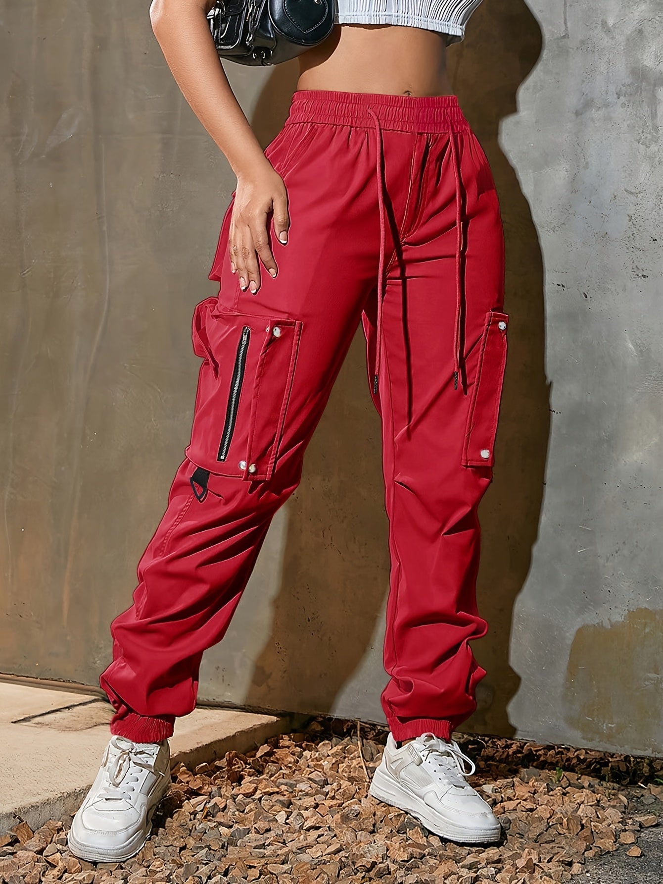 Men's black cargo jogger pants lightweight tech fabric oversized pockets D-ring hardware streetwear
