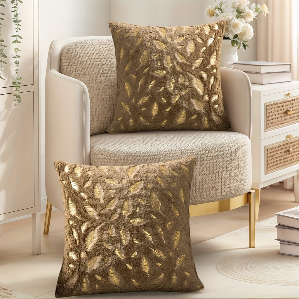 Ultra-soft faux fur throw pillow cover with shimmering metallic gold foil feather accents for luxe decor