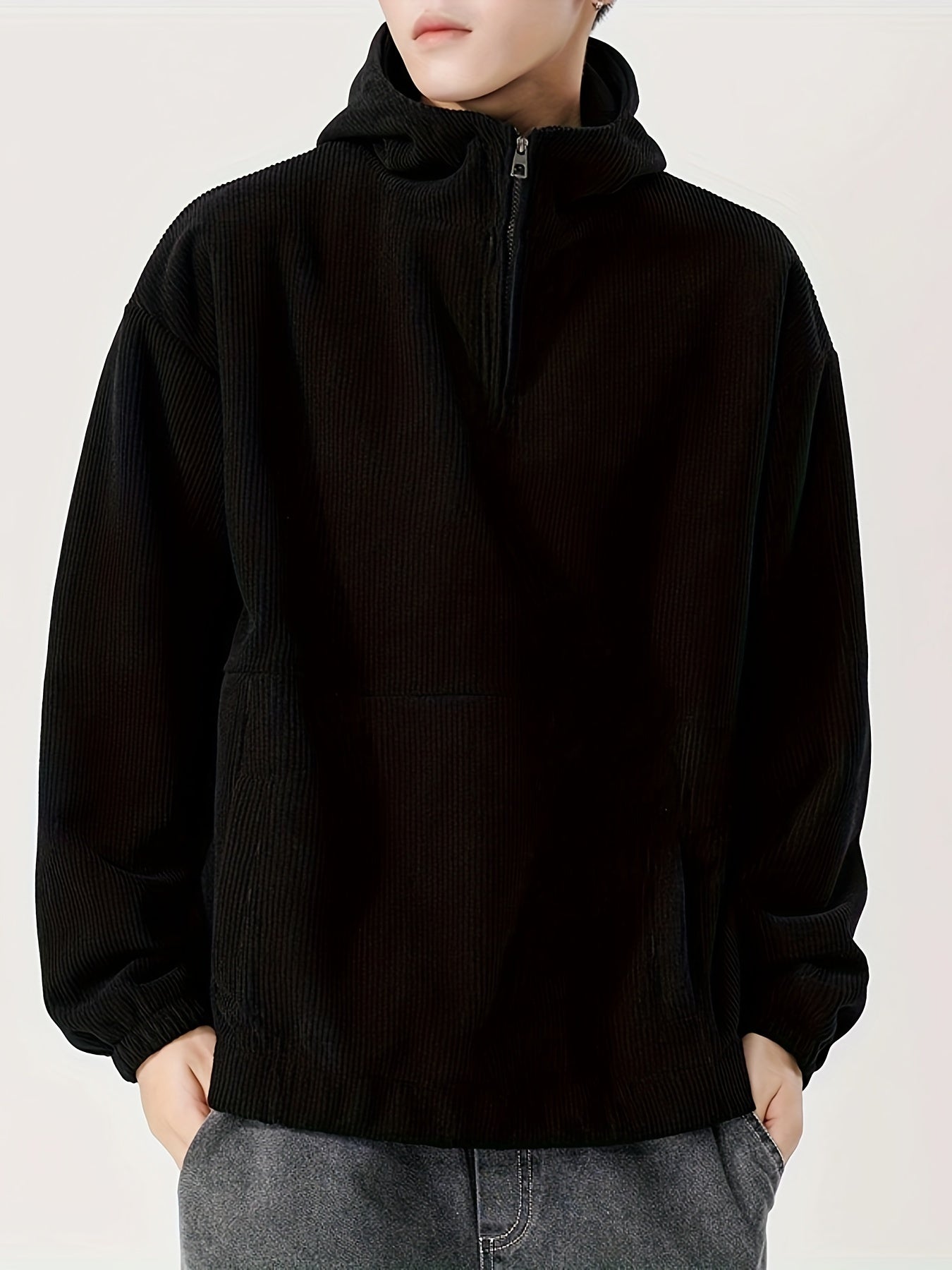 Beige fine-rib corduroy quarter-zip hoodie with structured fit and kangaroo pocket