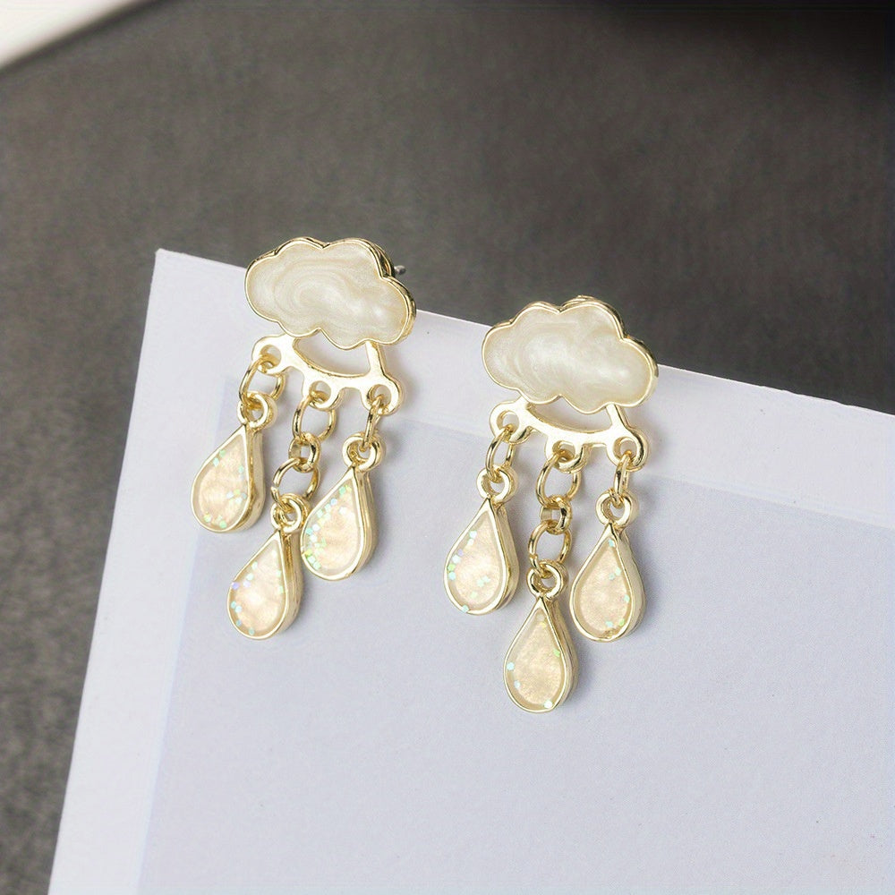 Gold-tone raindrop dangle earrings with swirled enamel clouds and glitter resin drops, lightweight statement jewelry