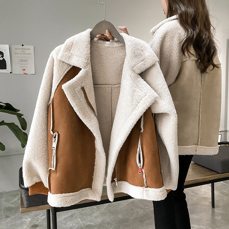 Women's oversized faux shearling coat in cozy plush texture for effortless cold-weather style