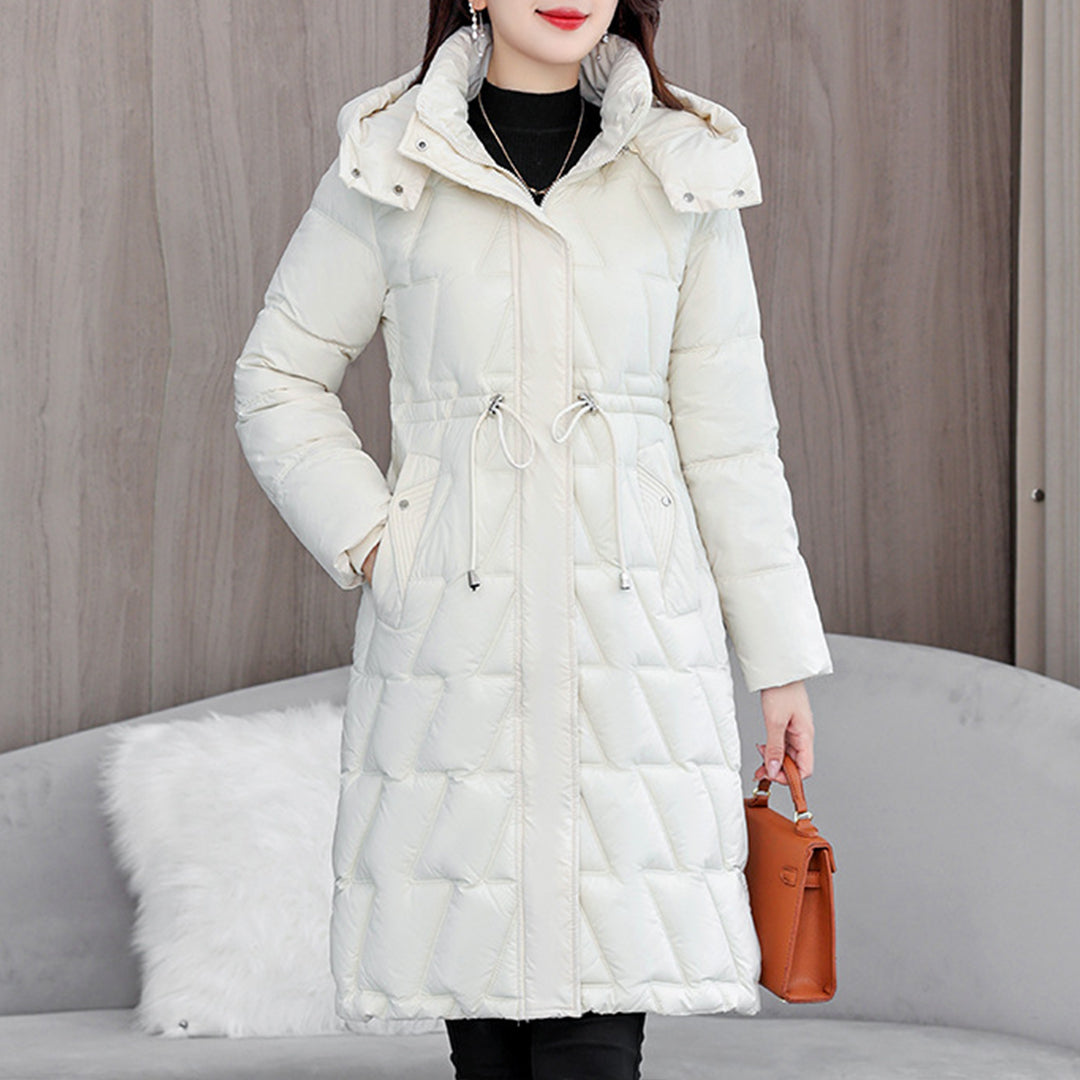 Women's long padded winter coat in neutral tone, slim silhouette with premium insulated lining