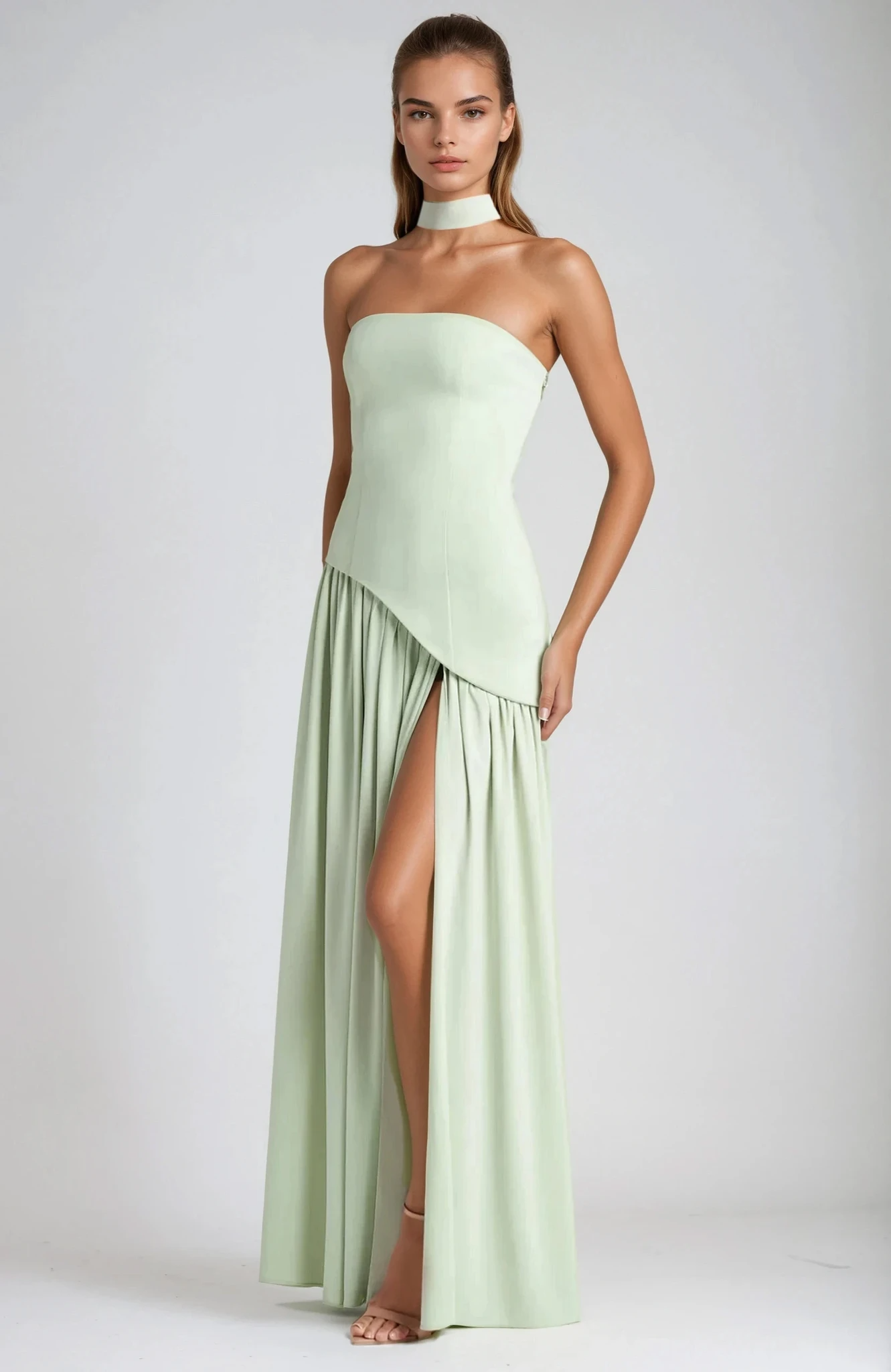 Black strapless evening gown sculpted bodice high slit formal dress sleek feminine silhouette