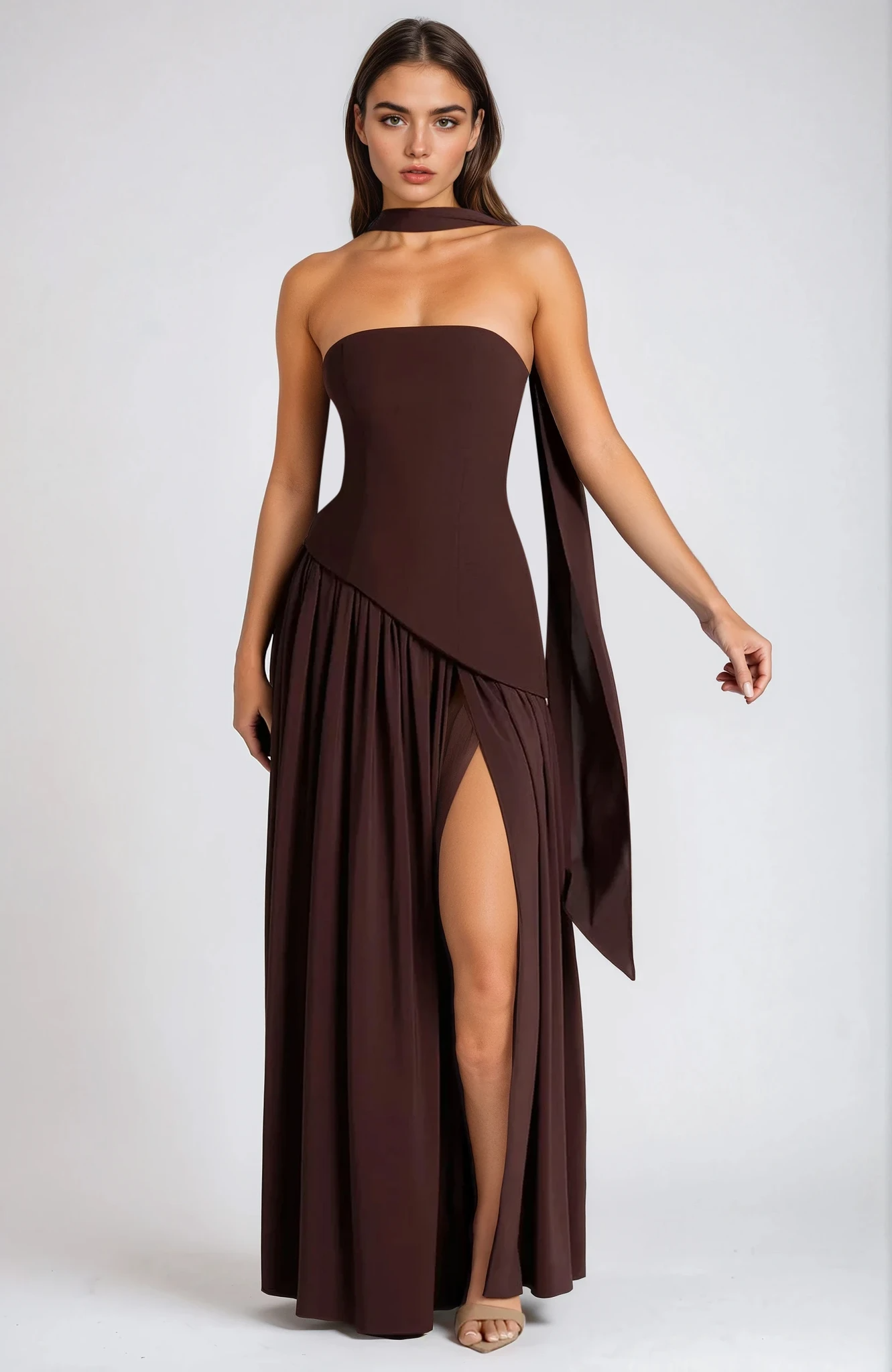Black strapless evening gown sculpted bodice high slit flowing formal dress sleek silhouette