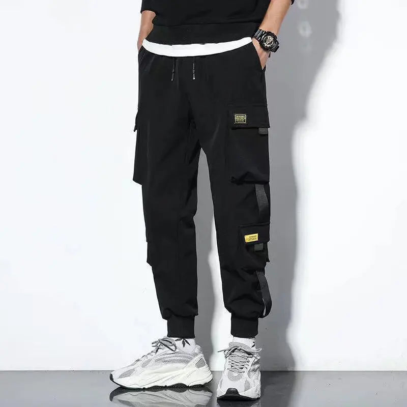Men's wide-leg cargo pants streetwear style with rugged workwear design and bold urban silhouette