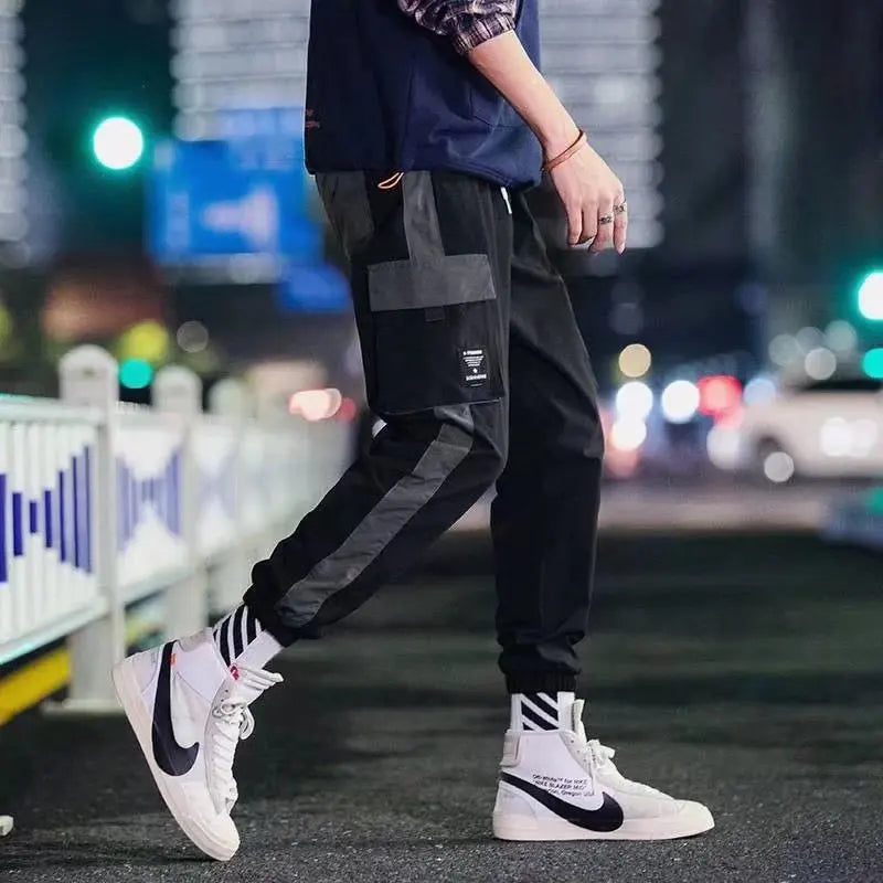 Men's wide-leg cargo pants streetwear style with rugged workwear design and bold urban silhouette