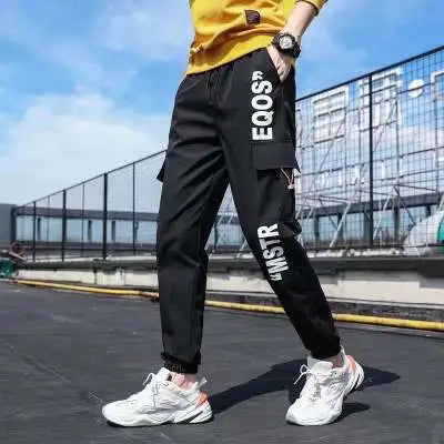 Men's wide-leg cargo pants streetwear style with rugged workwear design for urban comfort