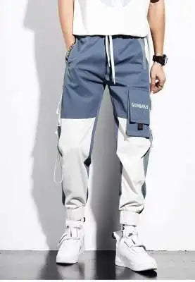 Men's wide-leg cargo pants streetwear style with rugged workwear design and bold urban silhouette