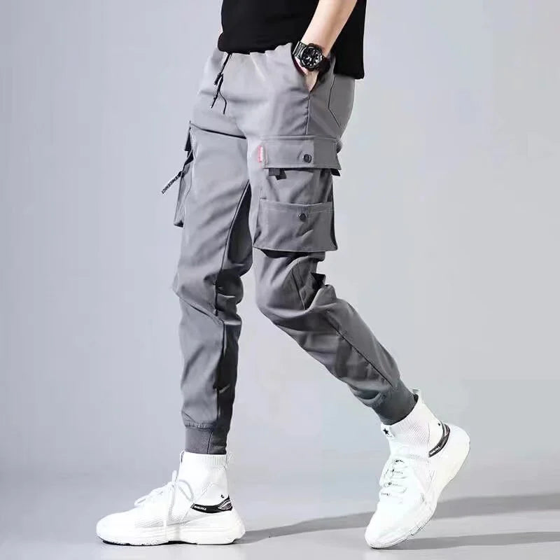 Men's wide-leg cargo pants streetwear style with rugged workwear design for urban comfort