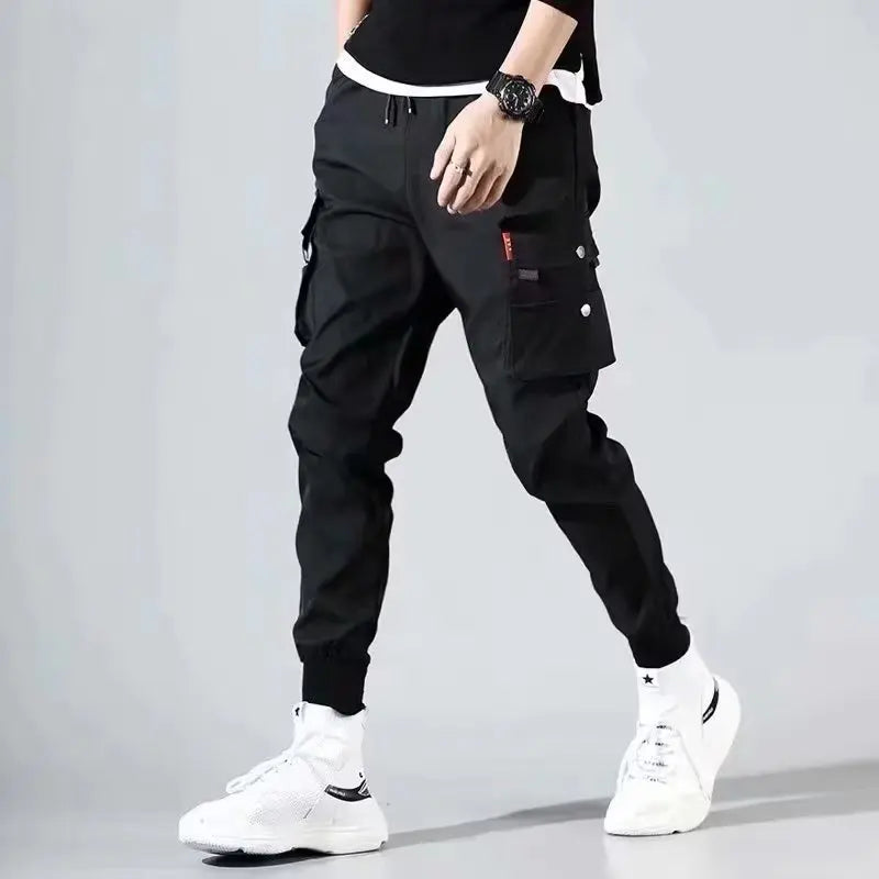Men's wide-leg cargo pants streetwear style with rugged workwear cut and bold urban silhouette