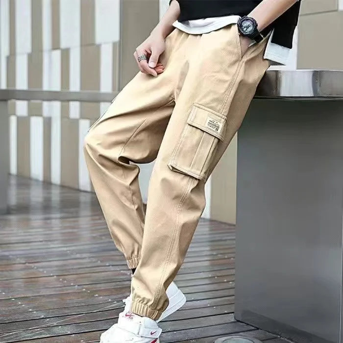 Men's wide-leg cargo workwear pants streetwear style with bold urban silhouette and rugged durability