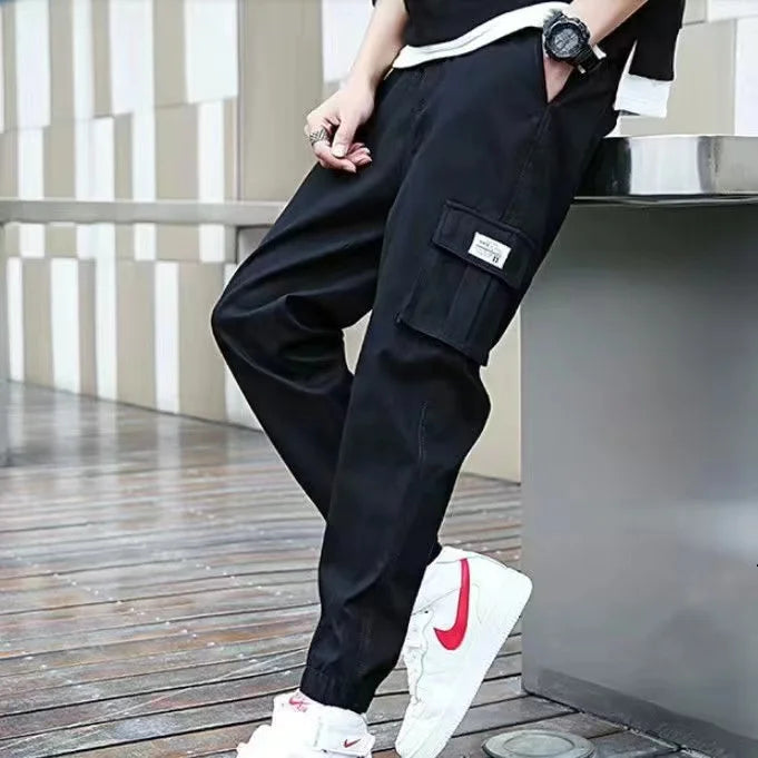 Men's wide-leg cargo pants streetwear style with rugged workwear design for urban comfort