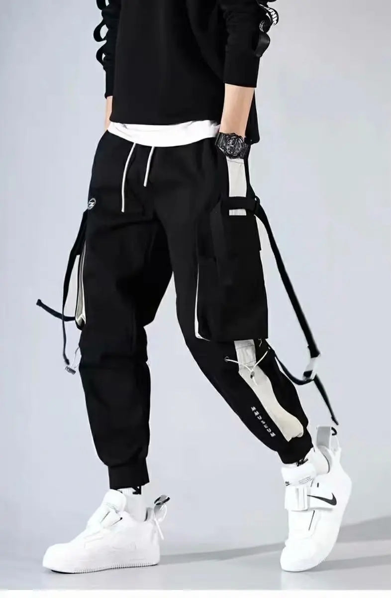 Men's wide-leg cargo pants in streetwear style with rugged workwear cut and bold urban silhouette