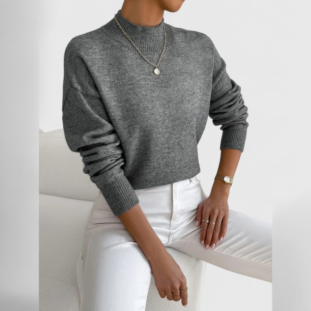 Women's beige turtleneck knit sweater, slim professional fit with ribbed smooth texture